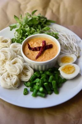  Khanom Jeen Nam Ya: Uma explosão de sabores picantes e uma sinfonia tropical em cada garfada!