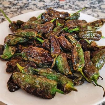  Pimientos de Padrón: Uma explosão saborosa em cada mordida! Apanhe o calor e prepare-se para uma experiência culinária inesquecível.